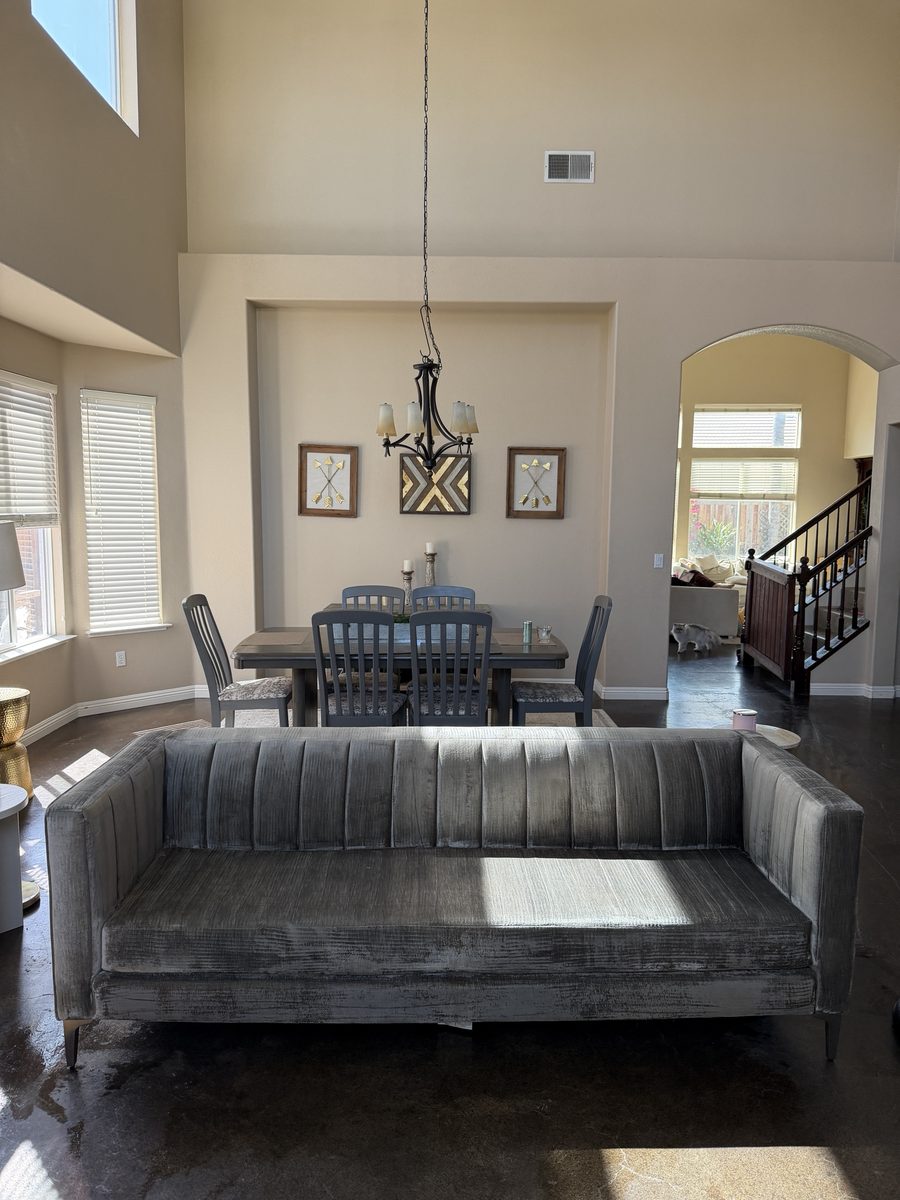 After: grey channel-tufted velvet sofa with an even color and restored pile