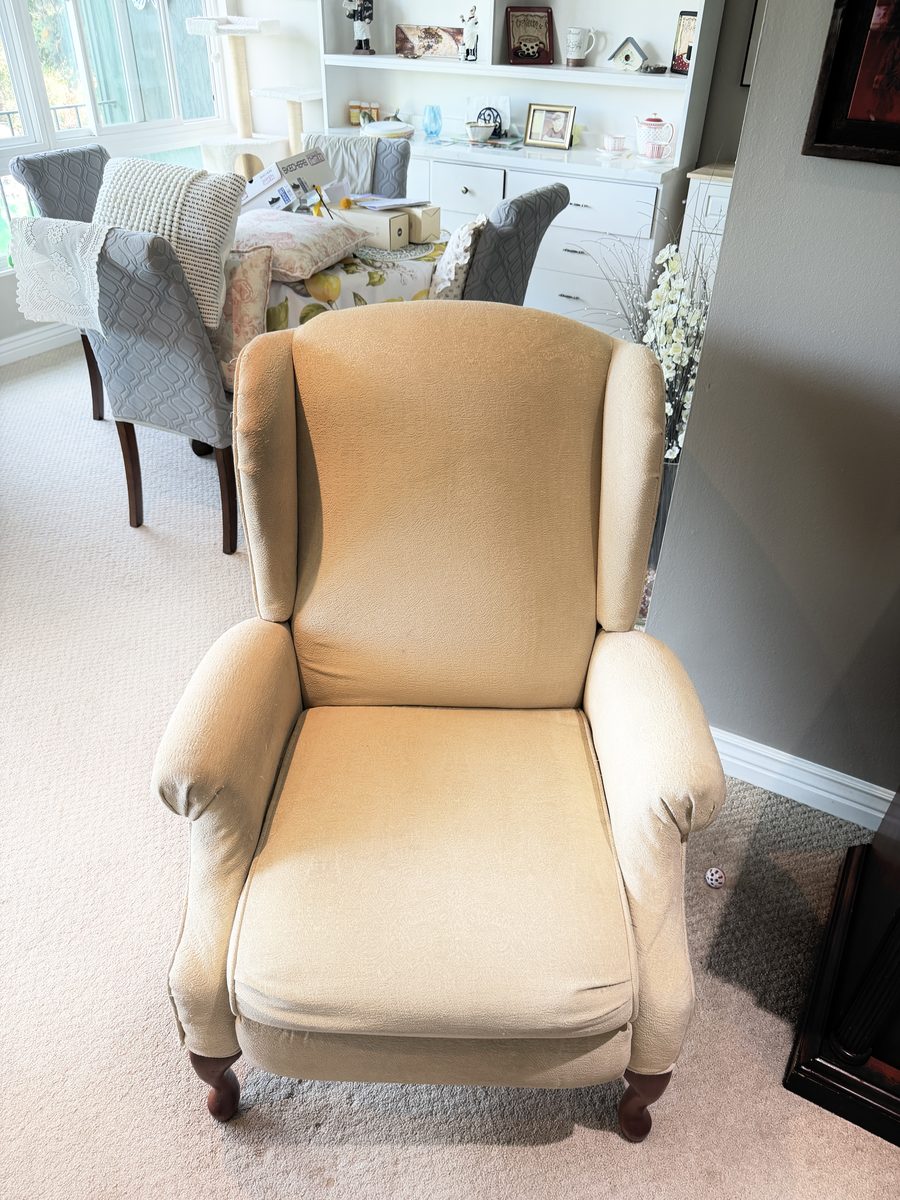 After: cream wingback recliner cleaned